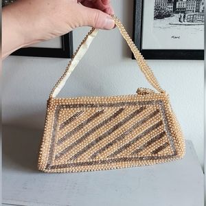 Small Midcentury PurseDecorated with small synthetic pearls.